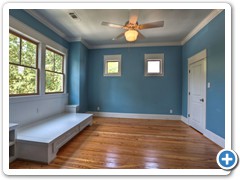 Secondary bedroom featuring large day bed with drawers.