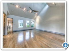 Another view of master suite, with windows that overlook the center courtyard below.