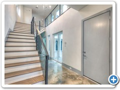 CityScape Construction’s signature two-story entry-hall fanned stairway.  